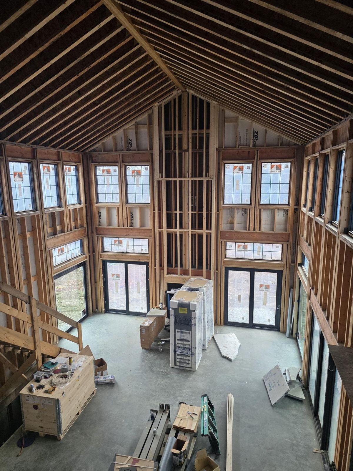 Vaulted room in open framing with new windows